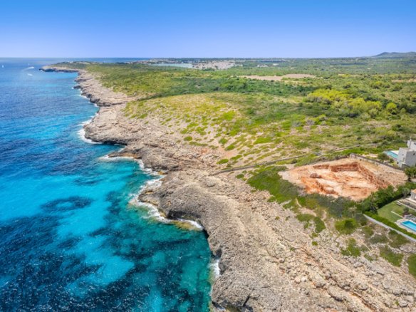 Aerial view of oceanfront plot in Mallorca with approved villa project contact Anderson West today to build your dream villa