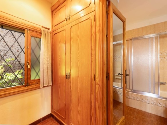 Bedroom with built-in wardrobes in property for sale Valldemossa