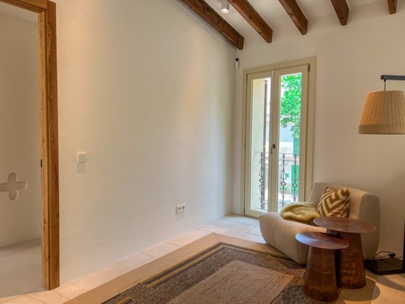 High-end townhome in Felanitx featuring poolside dining and sun terrace